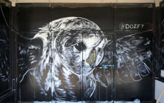 Dozfy mural of an owl at Ballard Blossom